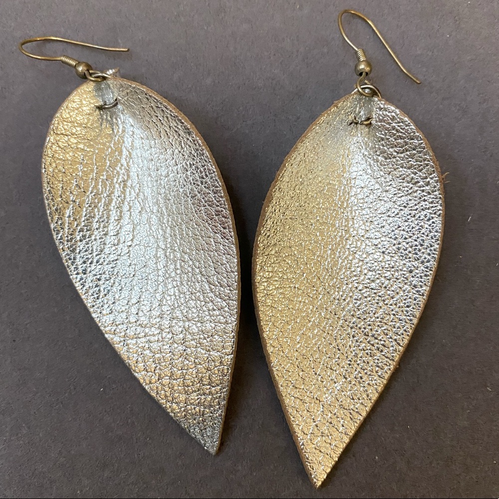 Statement silver leather teardrop earrings purchased at Thistle farms